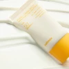 Осветляющий солнцезащитный крем SPF50+