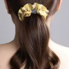 Шелковая резинка для волос "Оммаж" солнечно-желтая (в кейсе)